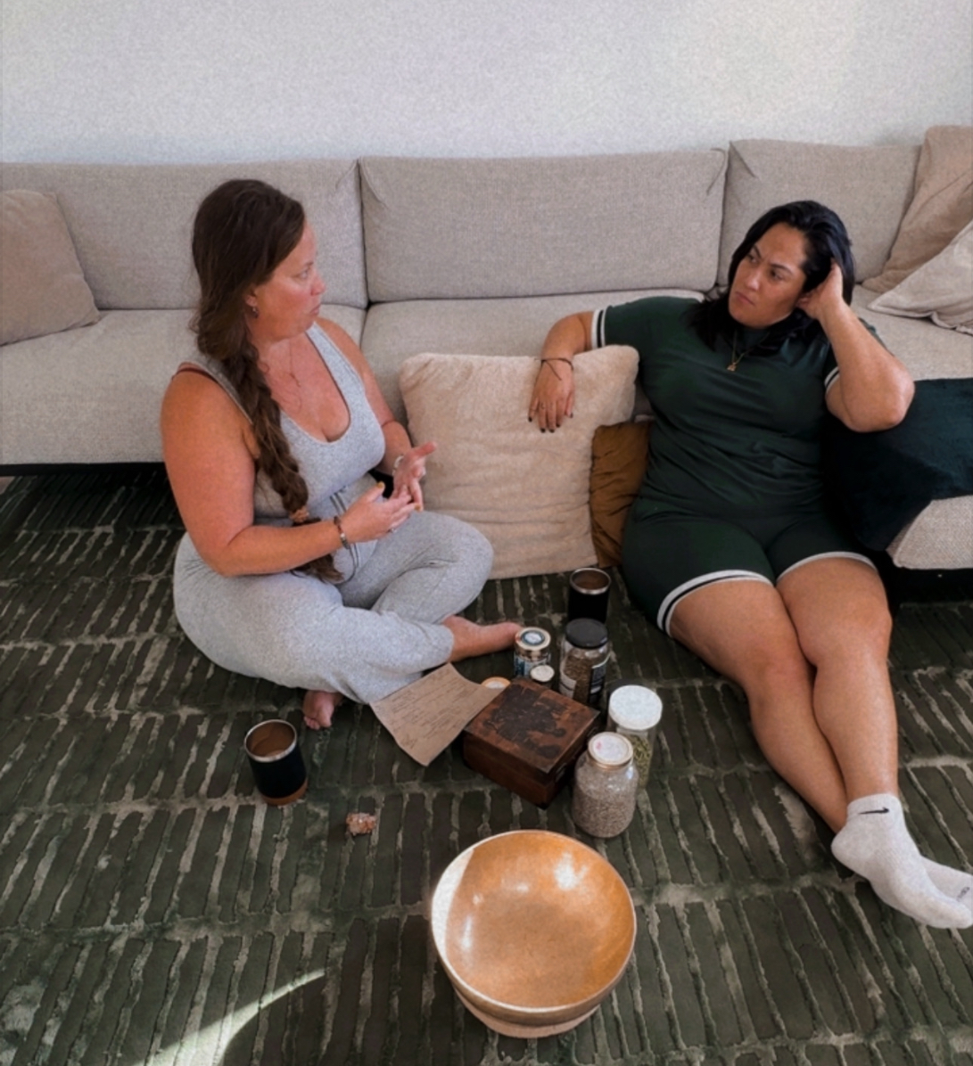 An aromatherapist consults with a client. 